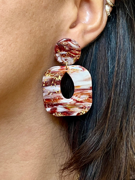 Emma mármol burdeos