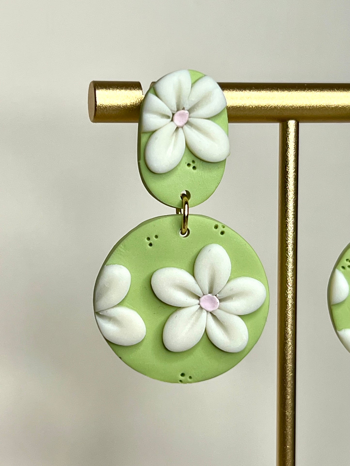 Manila floral verde y blanco