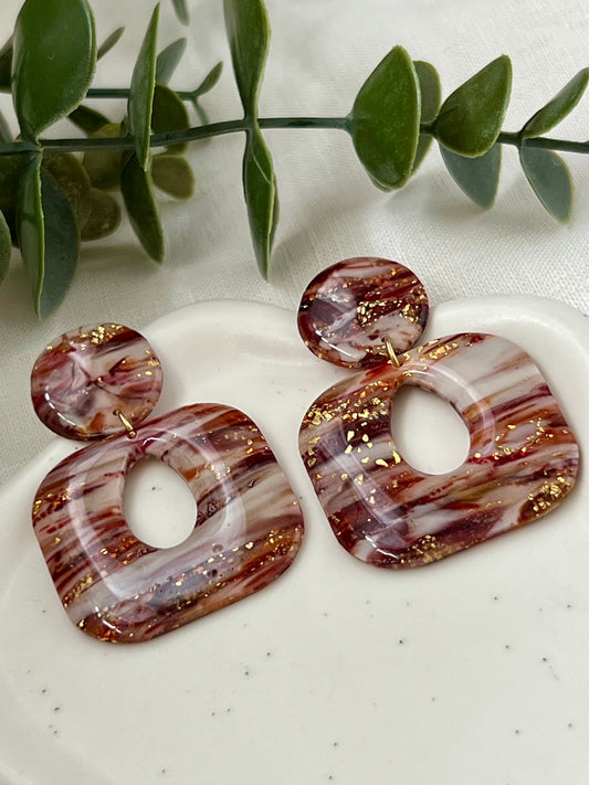 Emma mármol burdeos