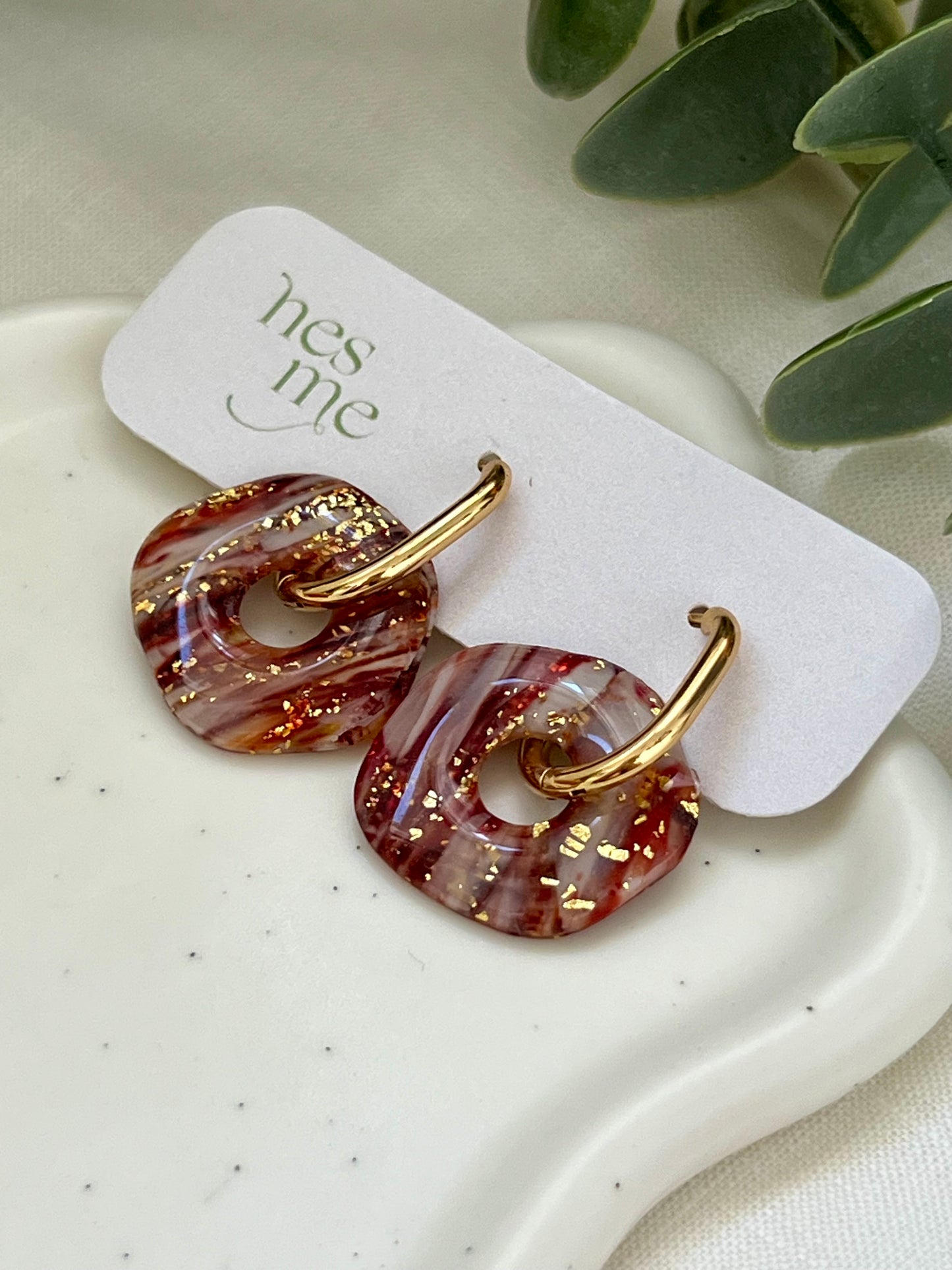 Oquira mármol burdeos