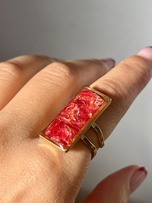 Nira mármol burdeos