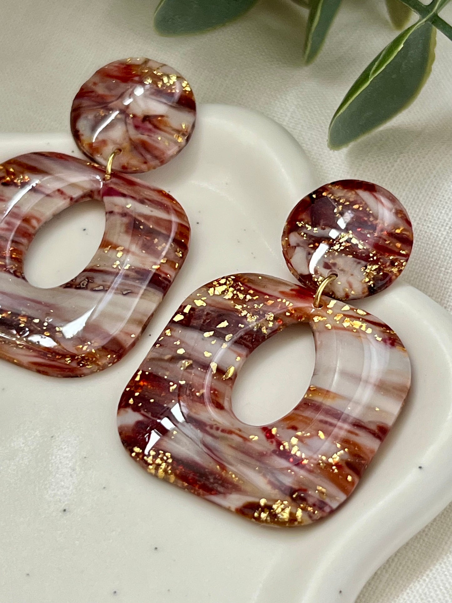 Emma mármol burdeos