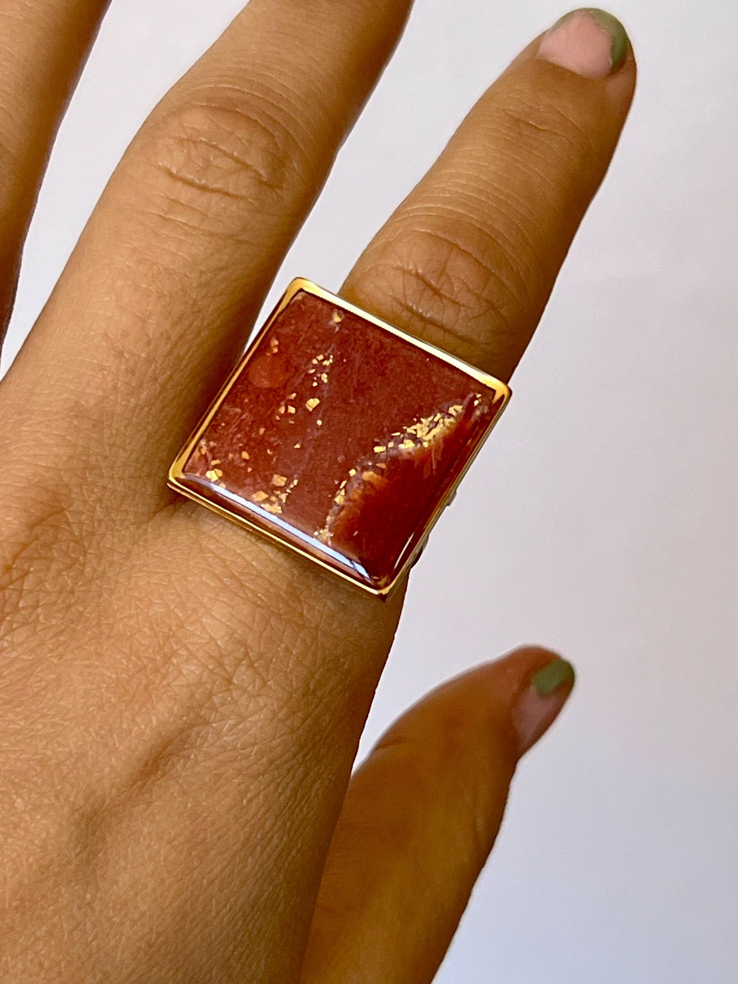 Telma mármol burdeos