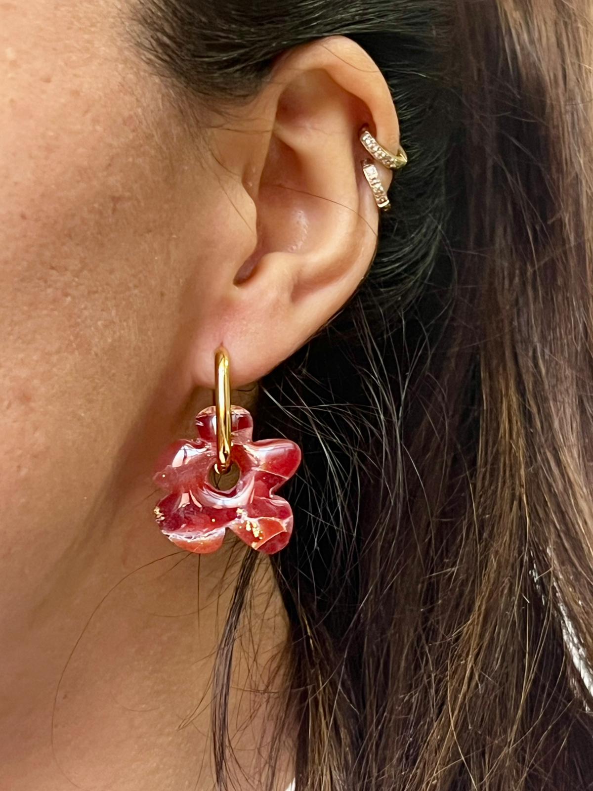 Flora mármol burdeos