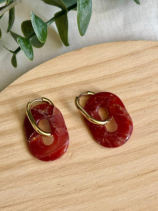 Clers mármol burdeos