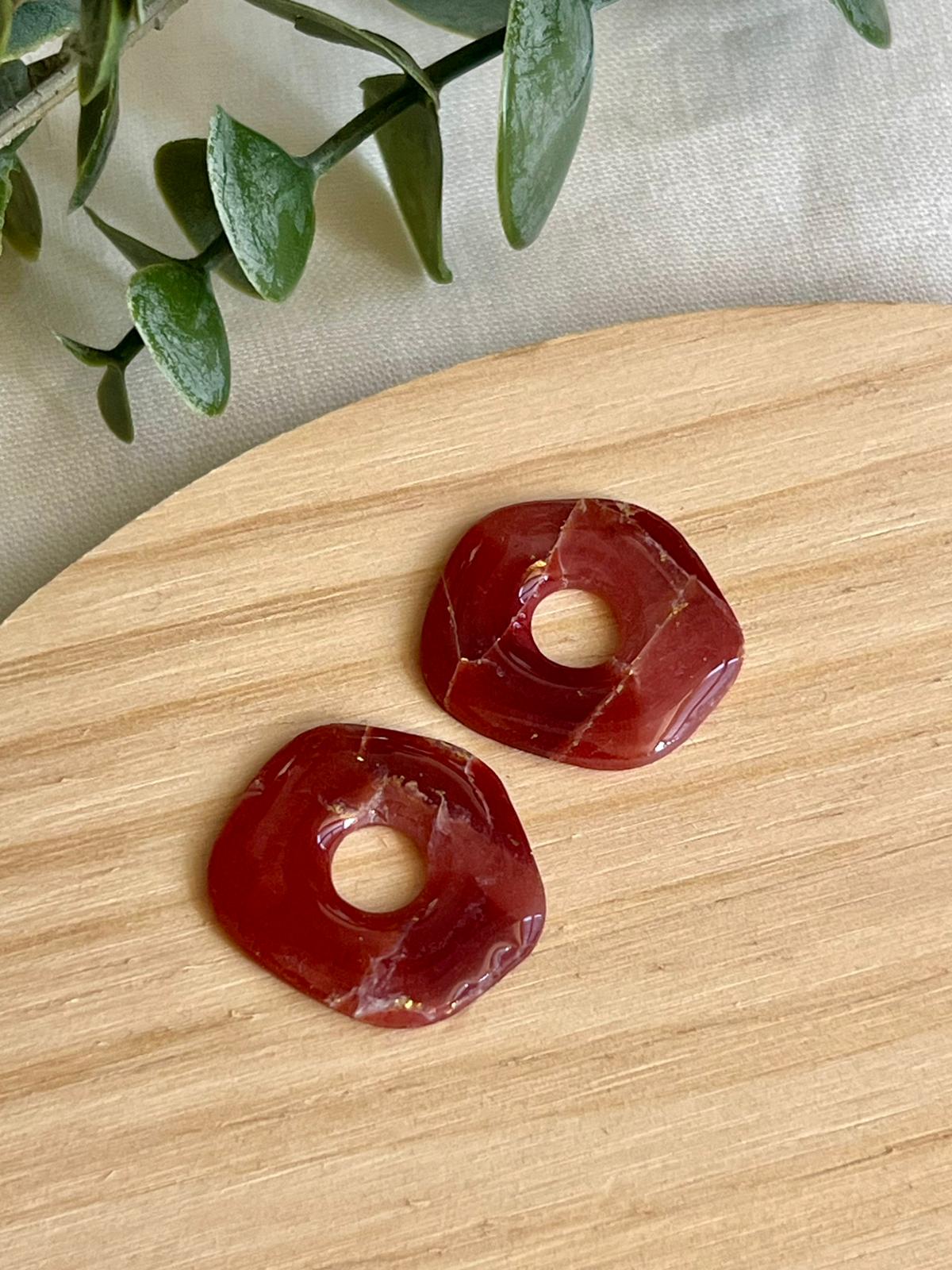 Oquira mármol burdeos