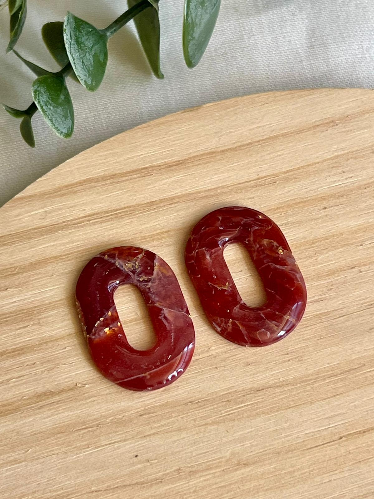 Clers mármol burdeos