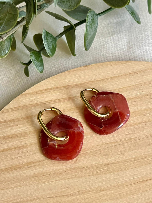 Oquira mármol burdeos