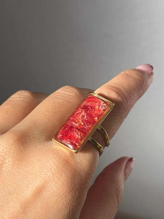 Nira mármol burdeos