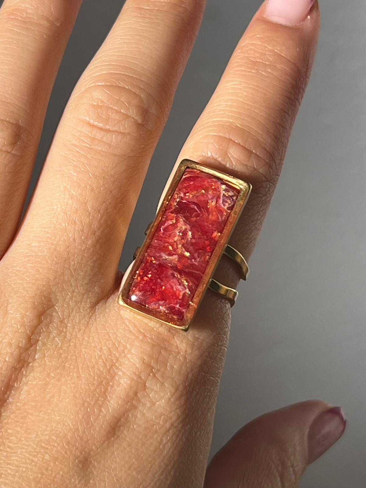 Nira mármol burdeos